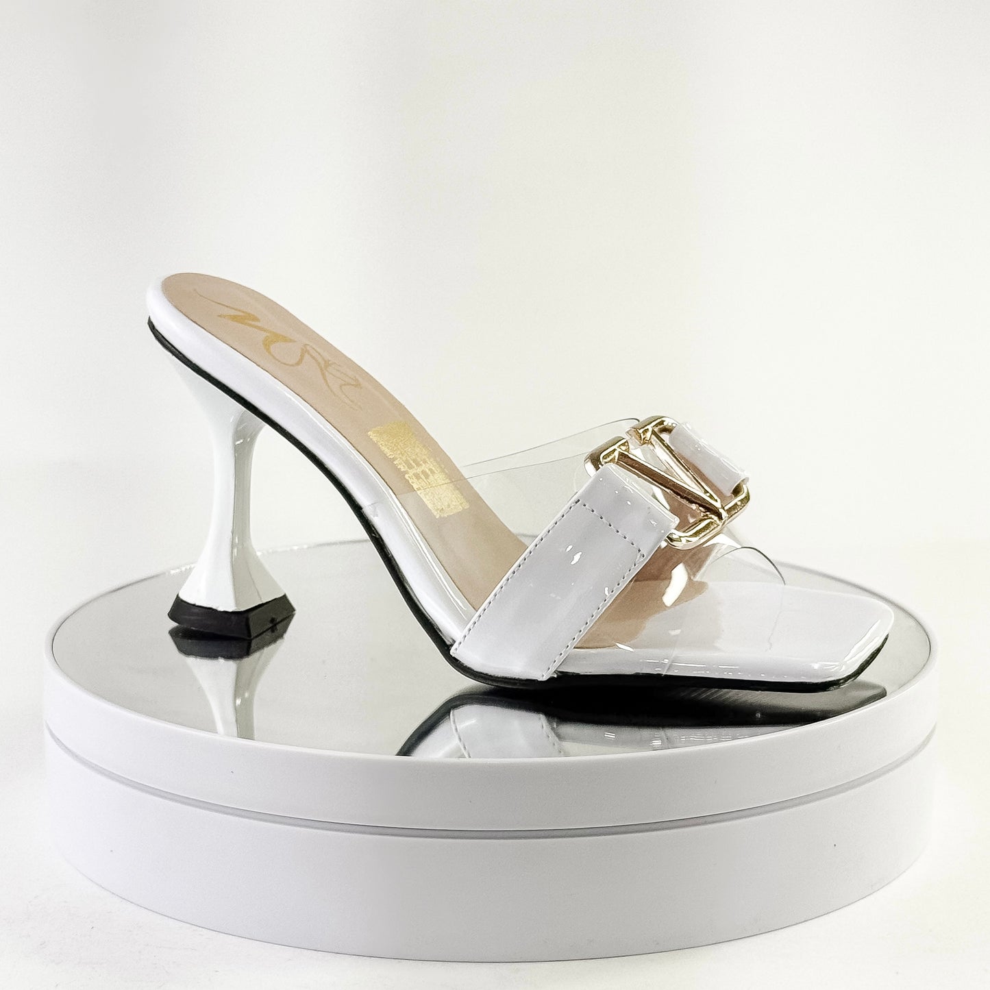 Tacones elegantes con transparencias y hebilla color blanco, tacón 7.5 cm para mujer - Milagros Moda