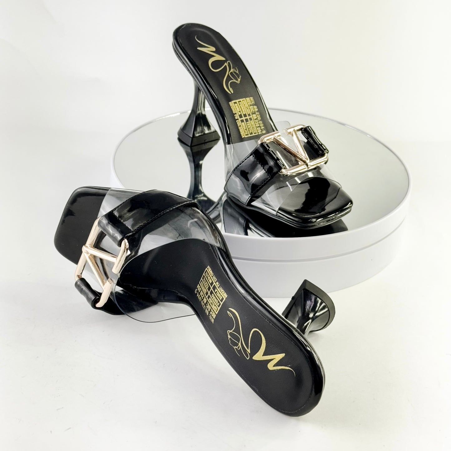 Tacones elegantes con transparencias y hebilla color negro, tacón 7.5 cm para mujer - Milagros Moda