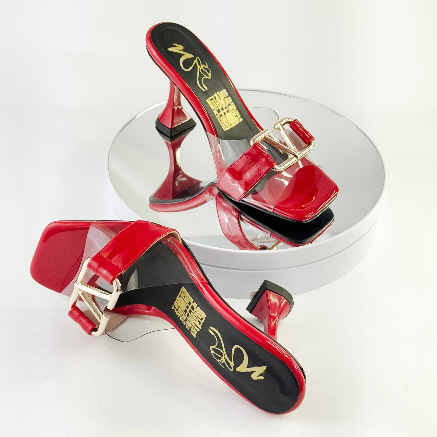 Tacones elegantes con transparencias y hebilla color rojo, tacón 7.5 cm para mujer - Milagros Moda