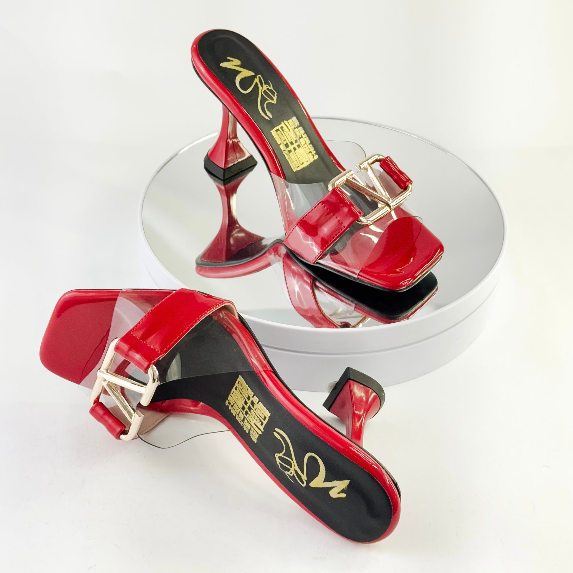 Tacones elegantes con transparencias y hebilla color rojo, tacón 7.5 cm para mujer - Milagros Moda